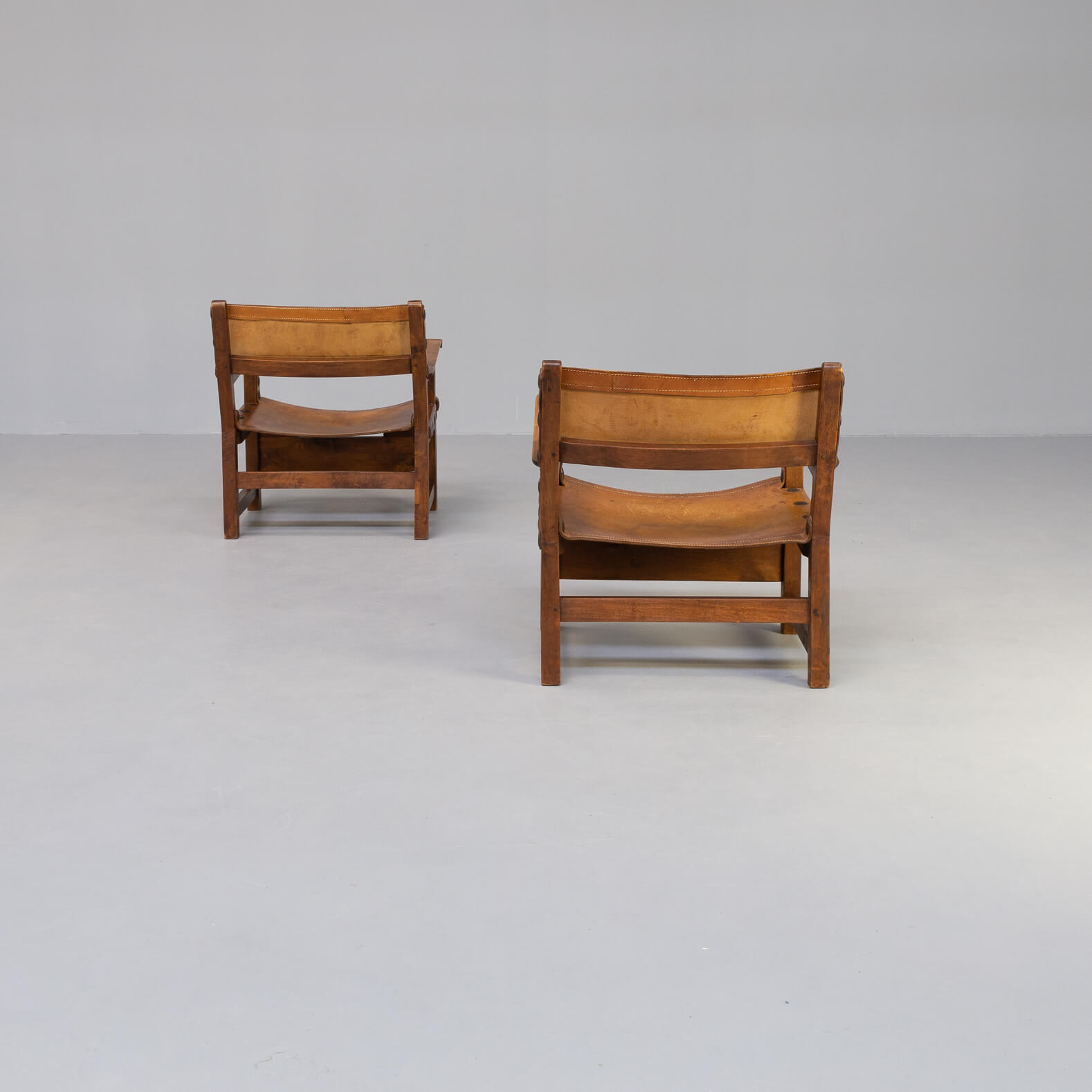 50s oak brutalist spanish chair with saddle leather