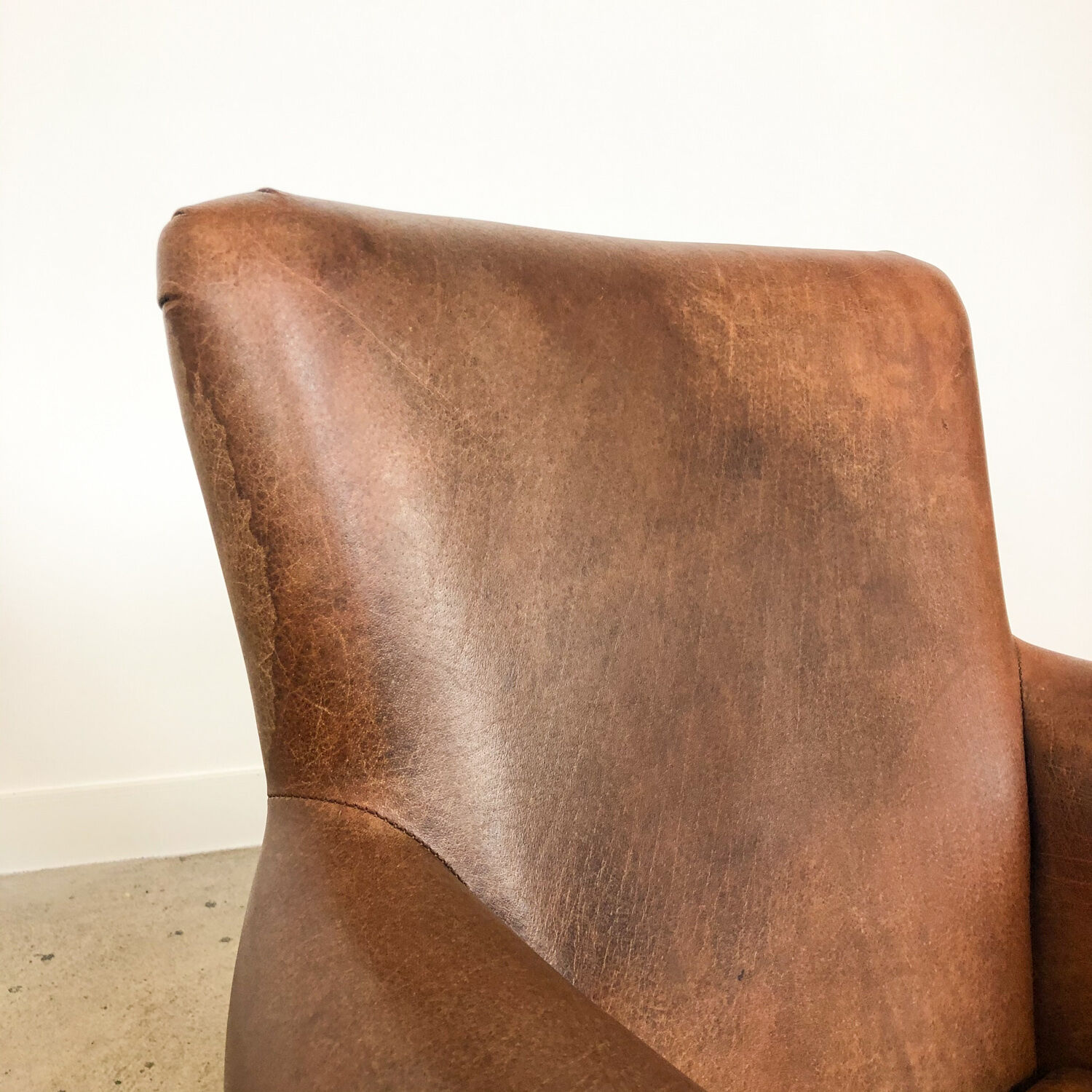 Set of two vintage leather armchairs