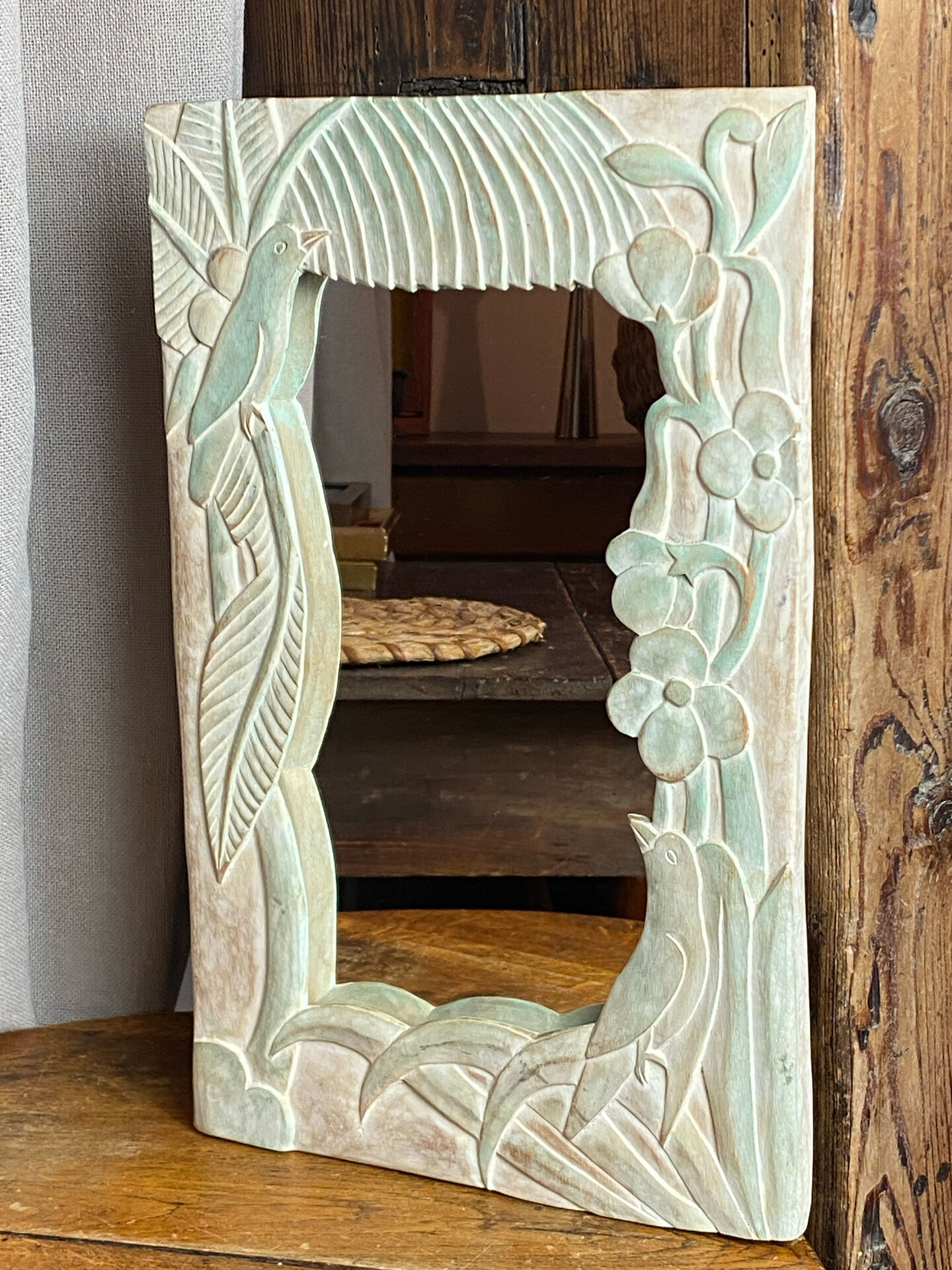 Carved wooden mirror