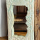 Carved wooden mirror
