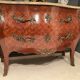 Curved commode with marquetry and marble top.