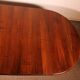 Extensible dining table from the early 19th century in walnut.