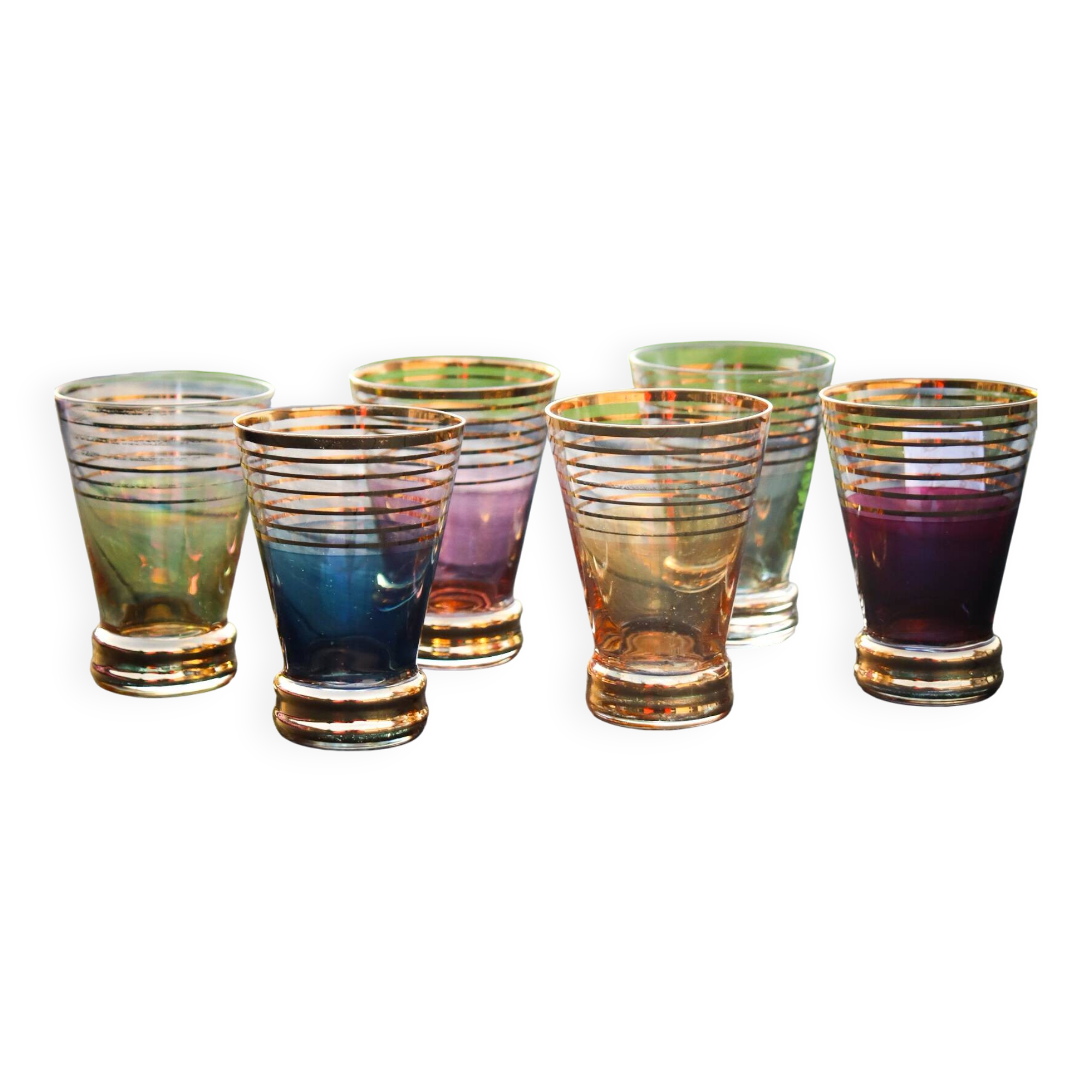 A vintage liqueur service in coloured and gold glass from the 1960s.