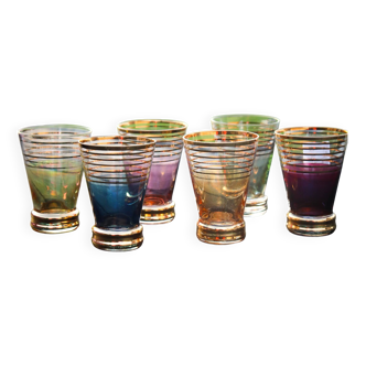 A vintage liqueur service in coloured and gold glass from the 1960s.