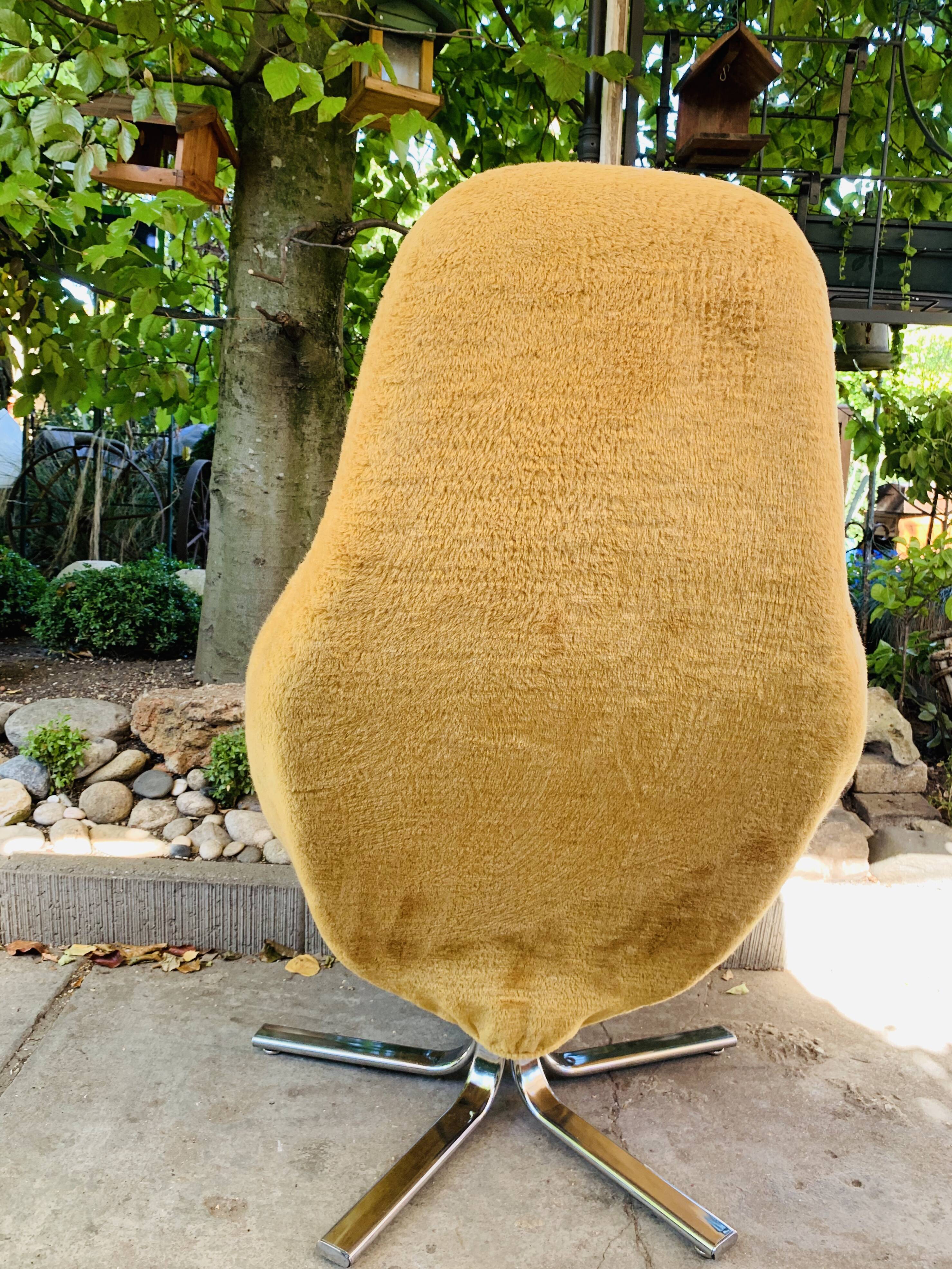 Space age mustard armchair