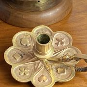 Handheld candlestick in bronze, card game decoration