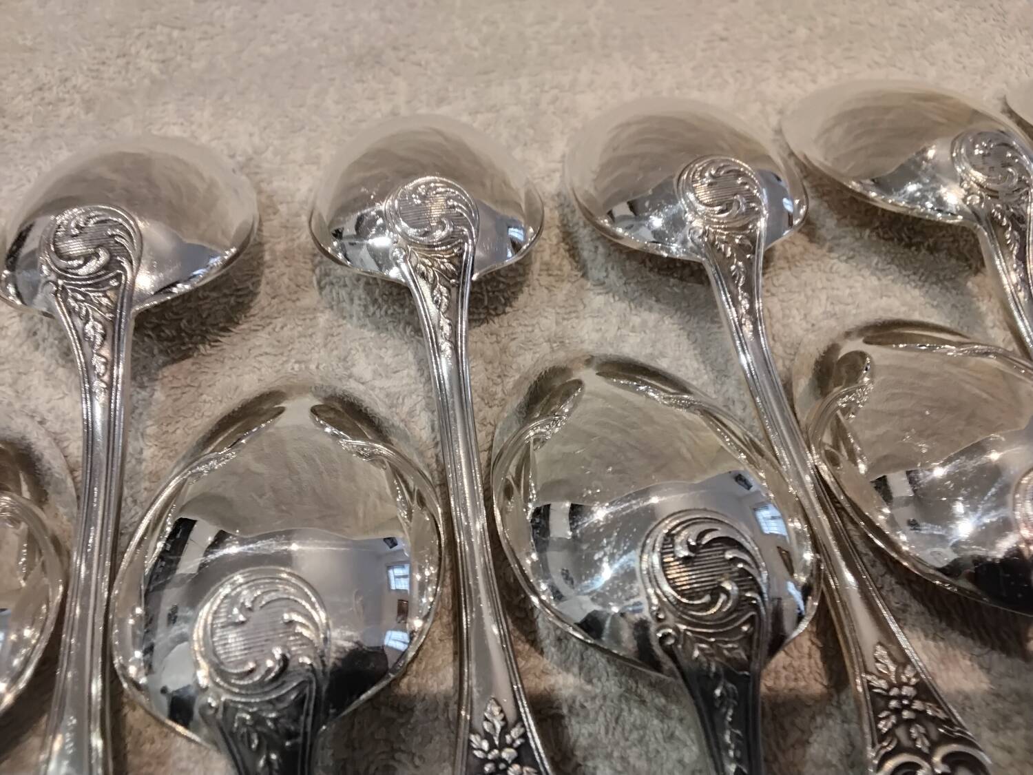 12 silver-plated metal soup spoons by the silversmith Boulenger LXV, half-rich.