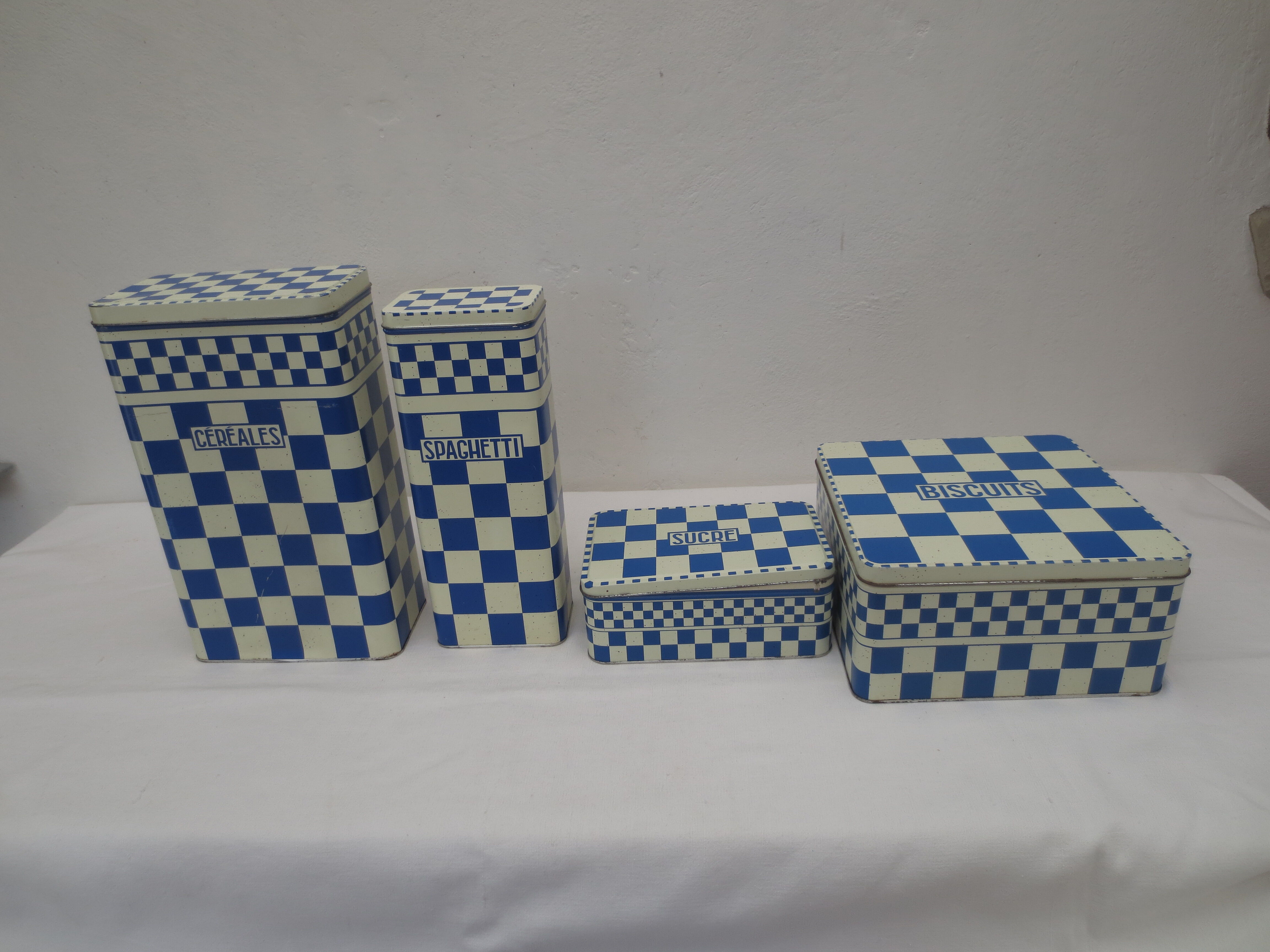 Series of 4 metal boxes, blue and white lustucru decoration