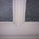 Large glazed door and its old glazed transom.