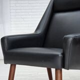 1970s, Danish highback armchair, black artificial leather, teak wood legs.