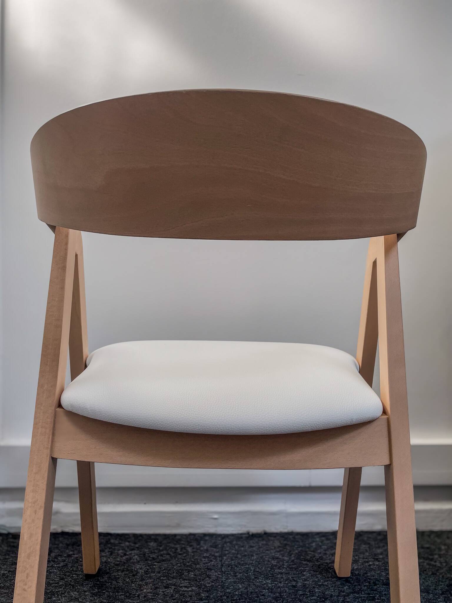 Professional chairs in beech and coated white textile