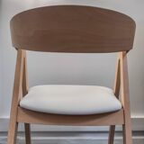 Professional chairs in beech and coated white textile