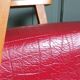 Compass leg armchair in solid beech & red crocodile-effect faux leather