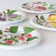 4 vintage plates in slurry fruit decoration