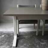 Dining table set and 4 dining chairs by Pierre Mennen for Pastoe.