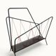 Vintage perforated metal magazine rack with cord handles by Matégot from the 1950s-60s.