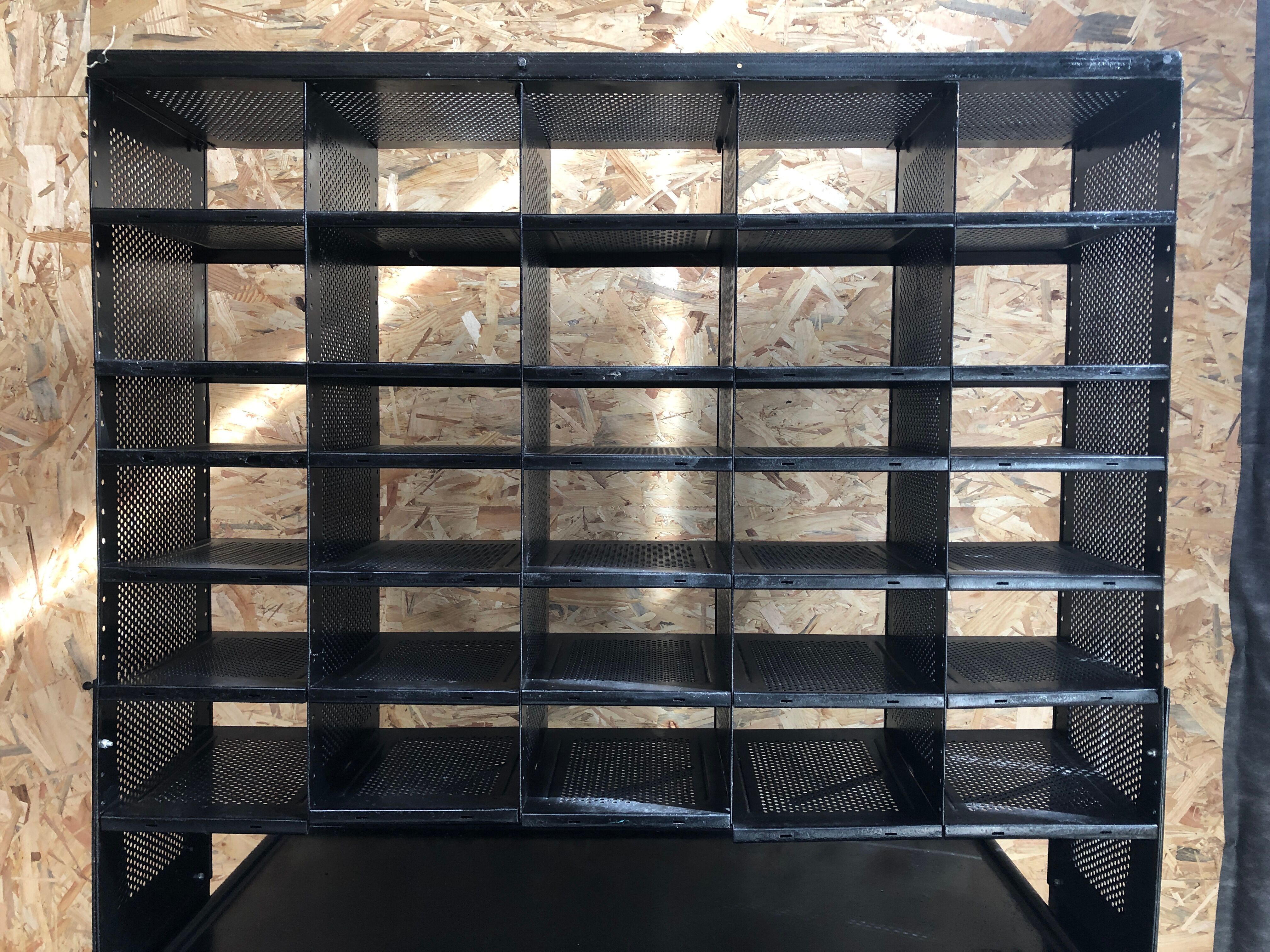 Old black metal postal sorting furniture + 30 perforated lockers + vintage stool