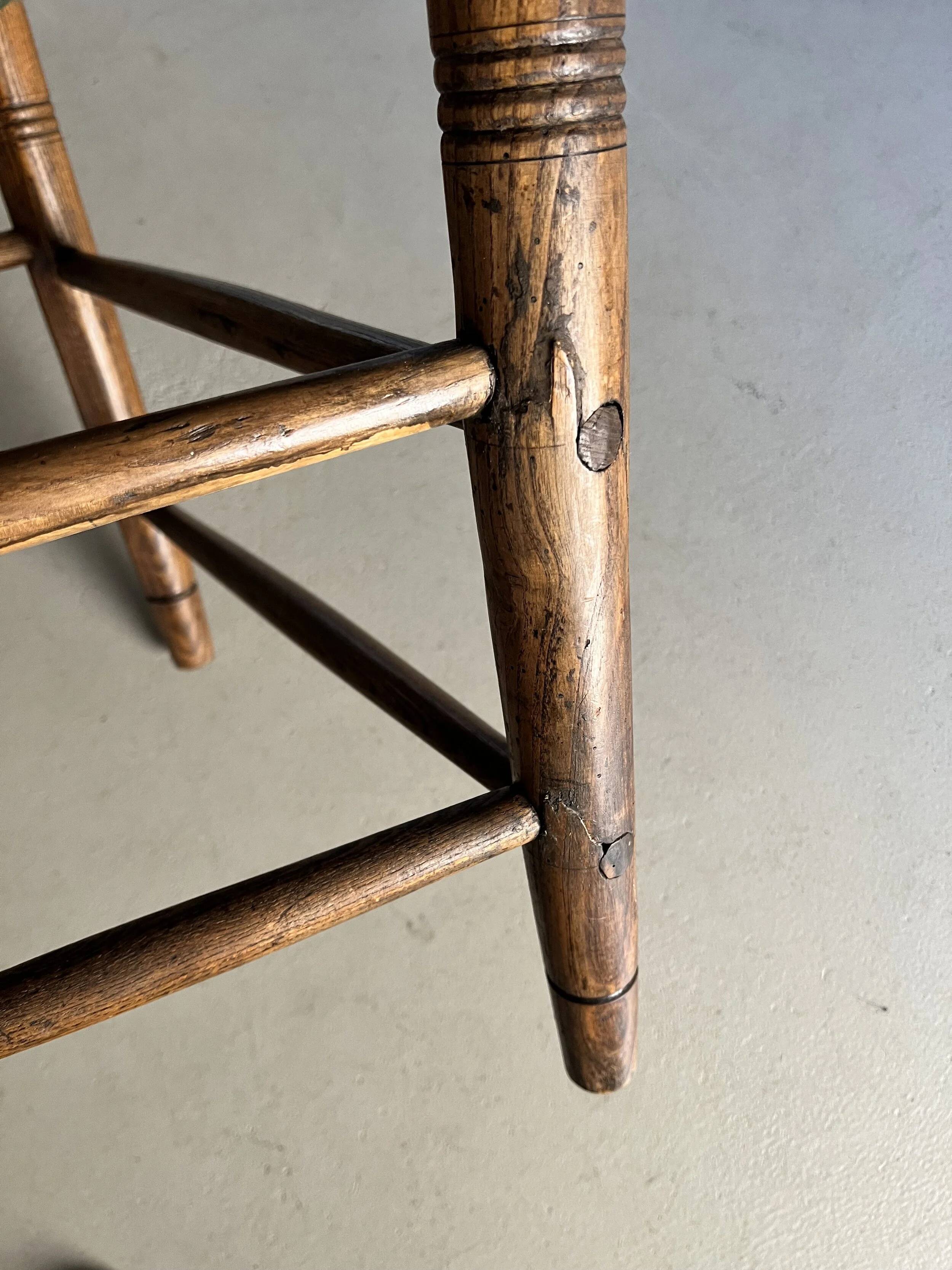 Rustic ladder-back oak chairs with embroidered seats | Netherlands | 1950s