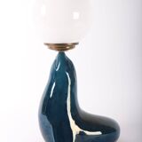 Blue ceramic sea lion lamp