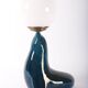 Blue ceramic sea lion lamp