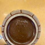 White vintage vase or pitcher with brown lines