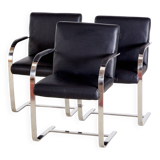 Steel armchair with leather upholstery