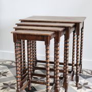 4 antique nesting tables made of turned wood