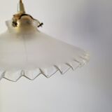 Serrated opaline suspension