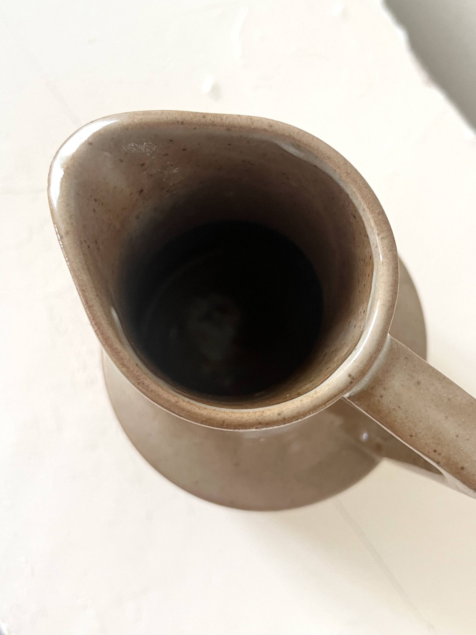 Enamelled ceramic carafe, high-fired stoneware, registered design.
