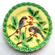 Art Deco slip plate yellow background Sarreguemines: 2 Birds pecking holly