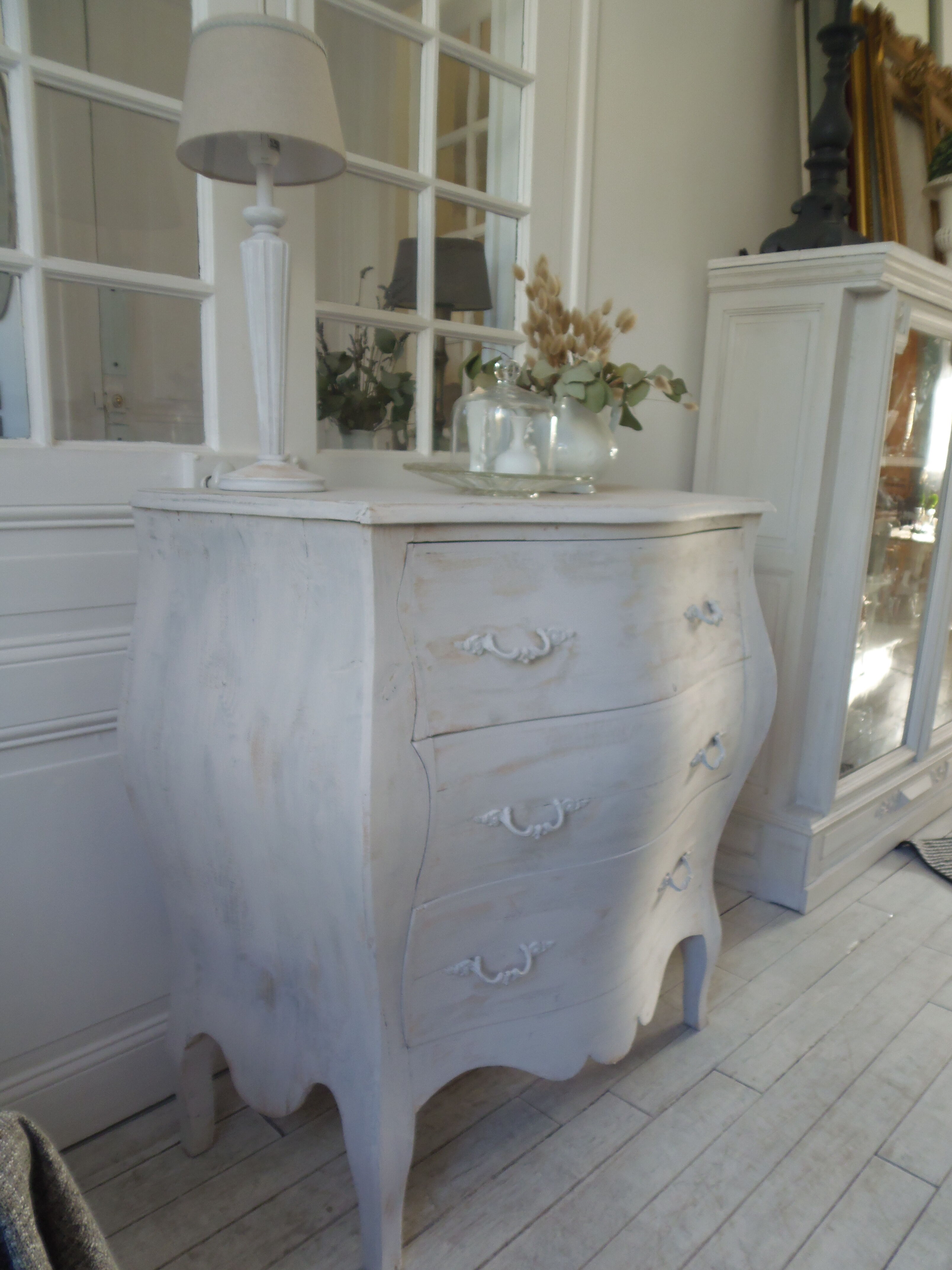 Curved patinated chest of drawers pearl grey waxed finish