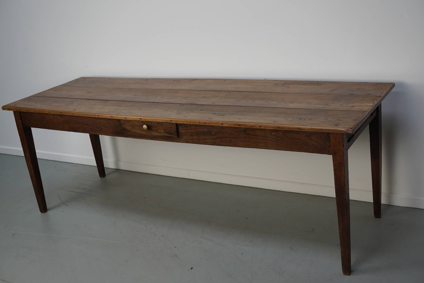 Large rustic farmhouse dining table from the French 19th century, in old elm