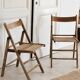 Pair of folding wooden chairs