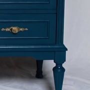 Restored vintage chest of drawers in navy blue, Louis XVI style.