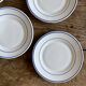 Set of 6 Arcoroc bread or dessert plates.