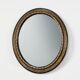 Miroir ovale néoclassique français en noir et or, 20e siècle