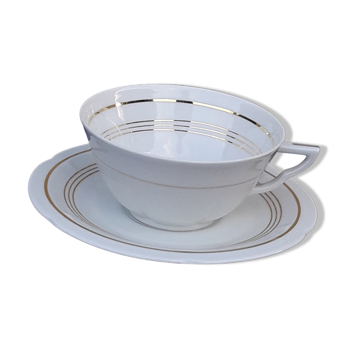 Tea cup with porcelain saucer from Limoges Charles Ahrenfeld bordered gilded