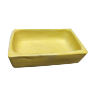 Empty pockets or butterstone in beige sandstone vintage old varnish
