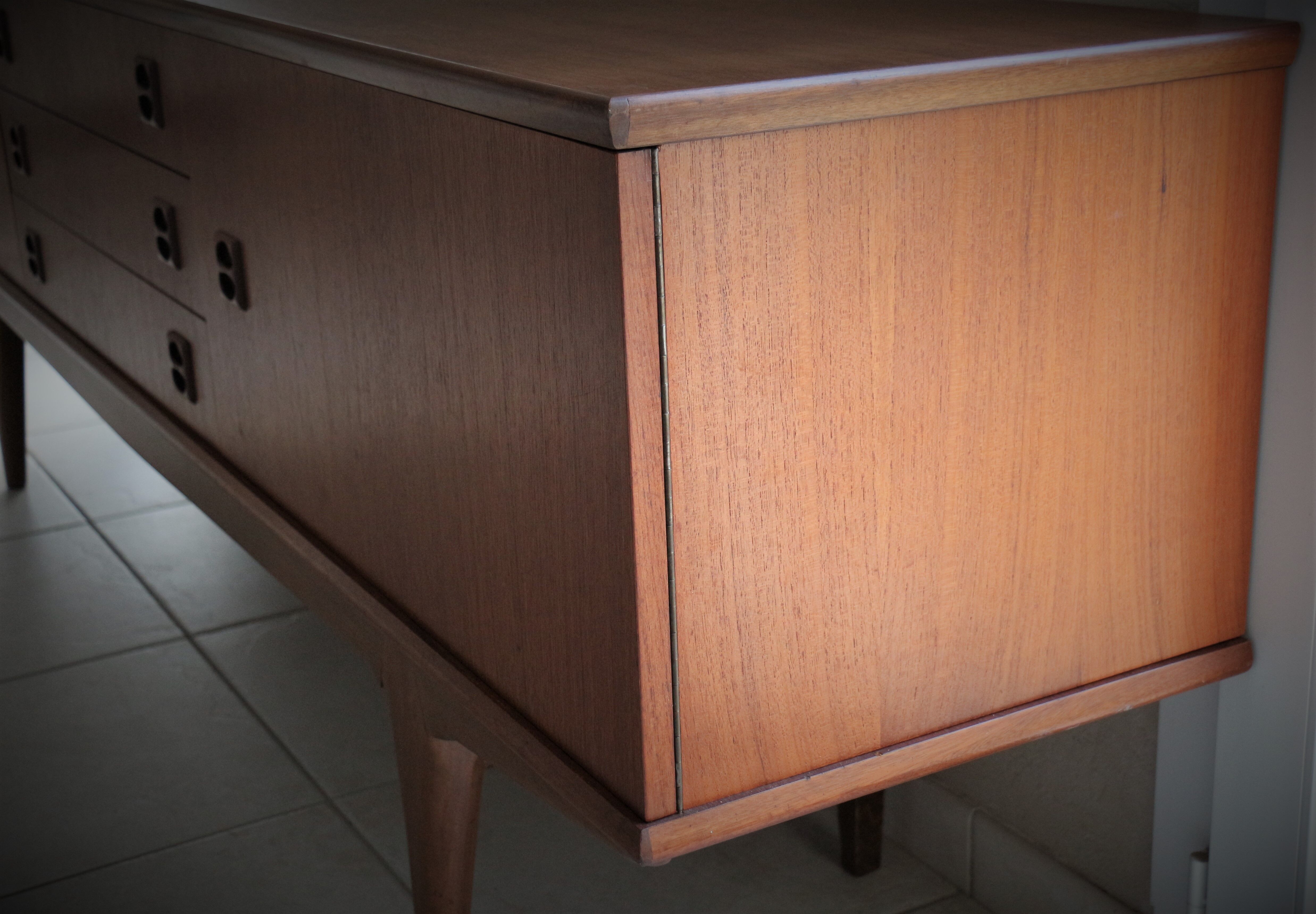 Scandinavian sideboard in teak and teak veneer in the late 60s