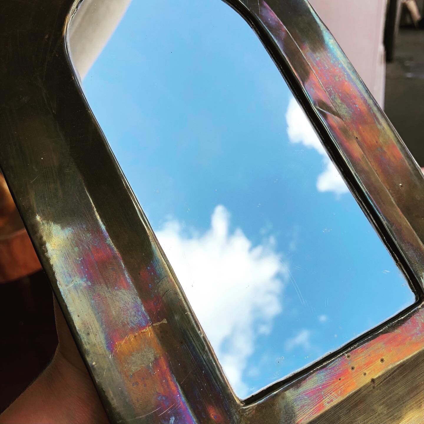 Oriental brass mirror