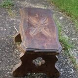 Bench in carved and varnished wood, mountain chalet decoration, old
