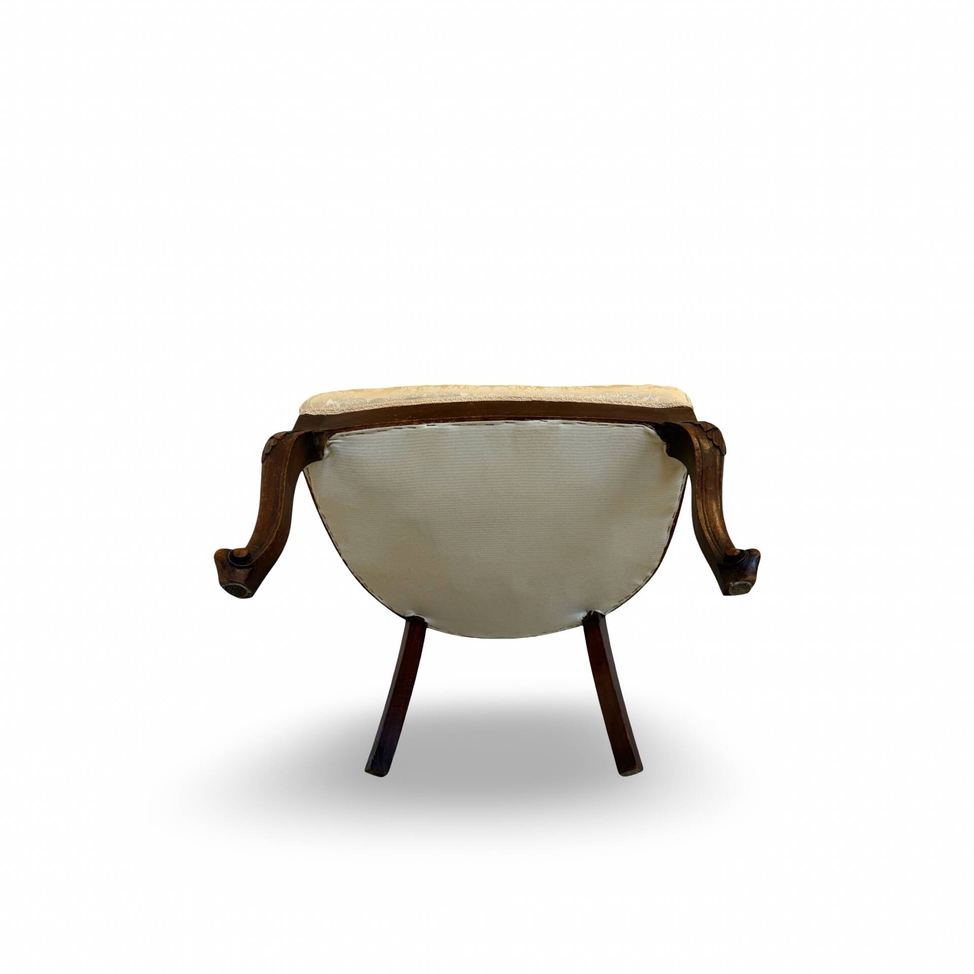 An antique Italian bar chair and a matching tufted vanity stool.