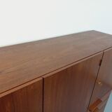 High Scandinavian modernist vintage sideboard in teak and black metal.
