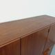 High Scandinavian modernist vintage sideboard in teak and black metal.