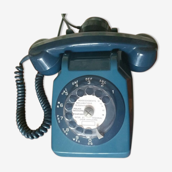 Blue rotary dial telephone