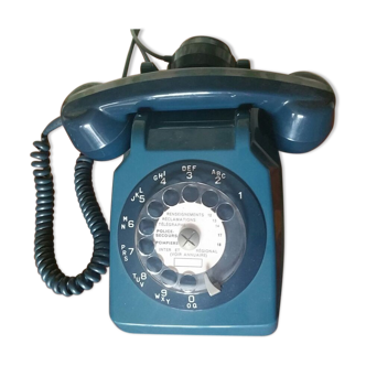 Blue rotary dial telephone