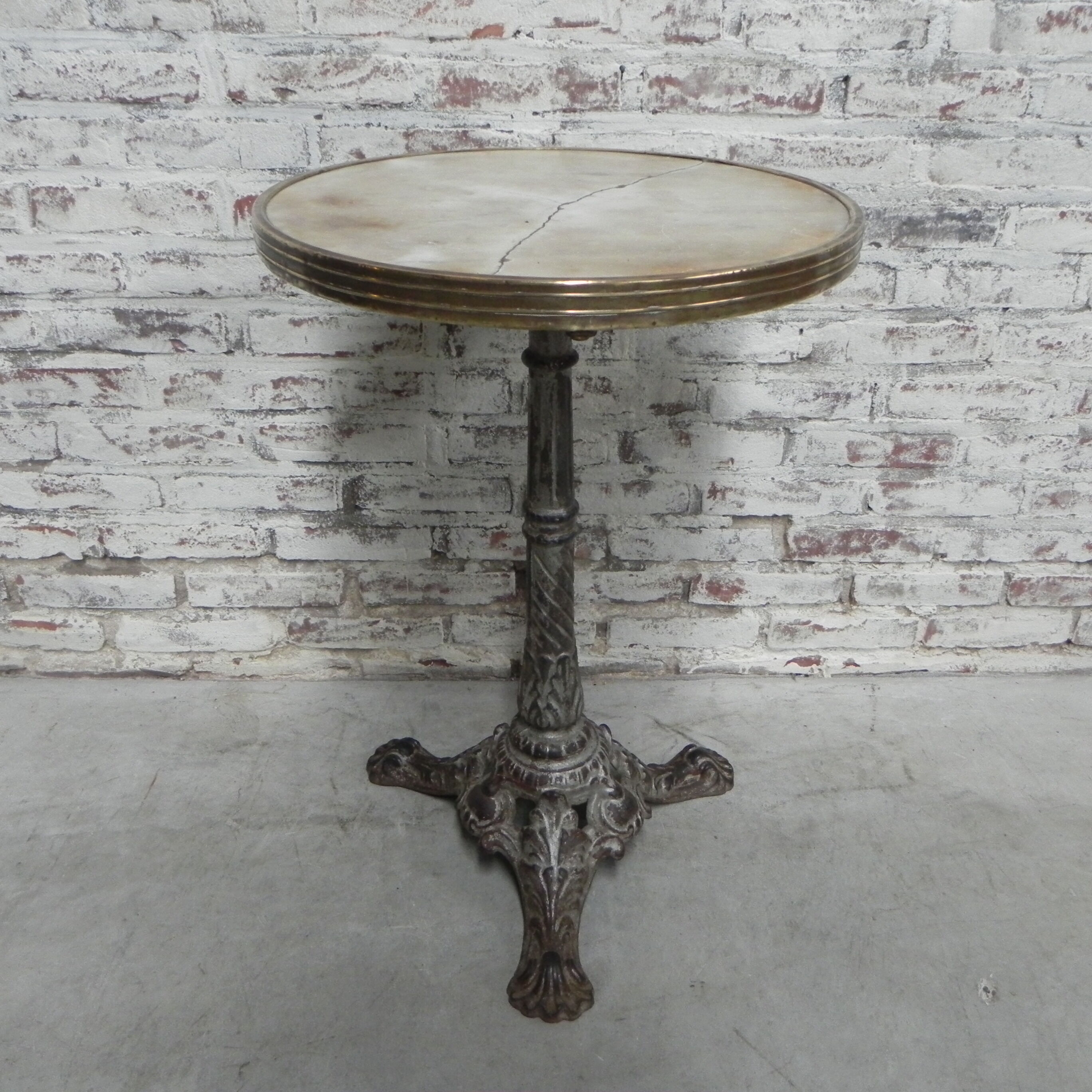 Bistro table with cast iron leg