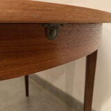 Scandinavian round teak dining table from the 60s extendable
