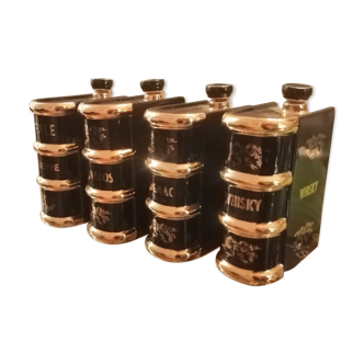Série de 4 flacons d'alcool en porcelaine noir
