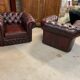 Paire de fauteuils chesterfield cuir